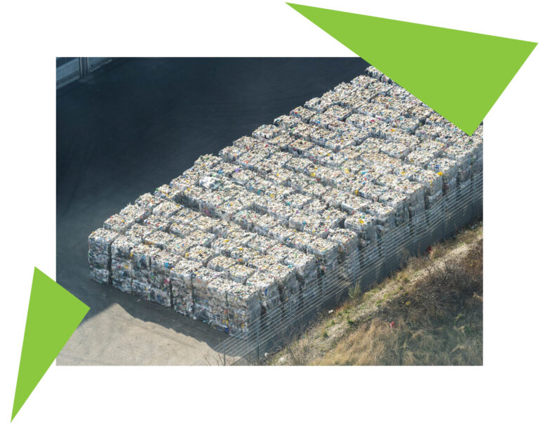 Aerial view of compacted plastic waste for advanced recycling technology.