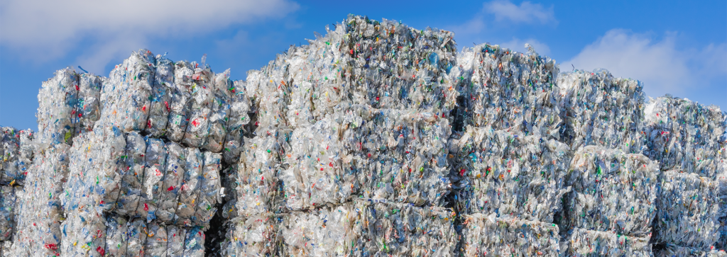 Pre-processed plastic feedstock for advanced recycling